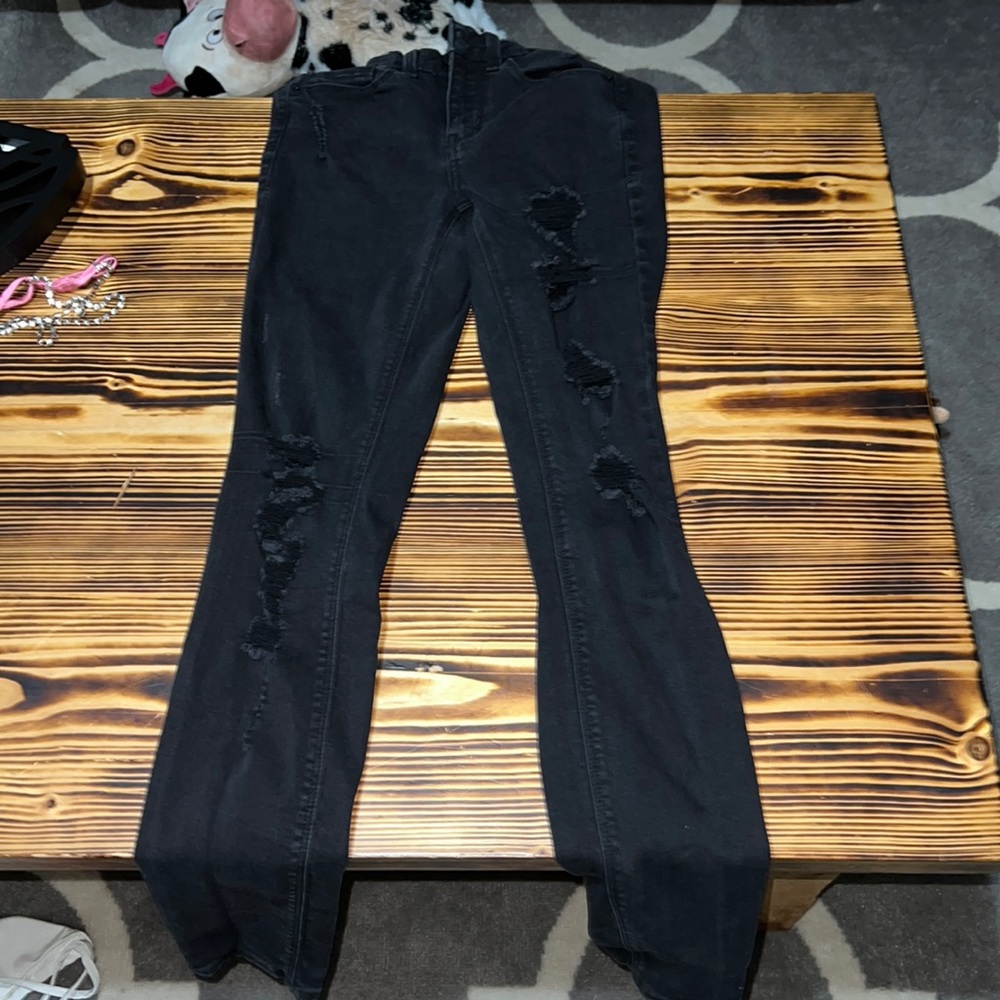 black ripped jeans